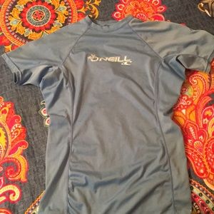 Light blue O'Neil rash guard.